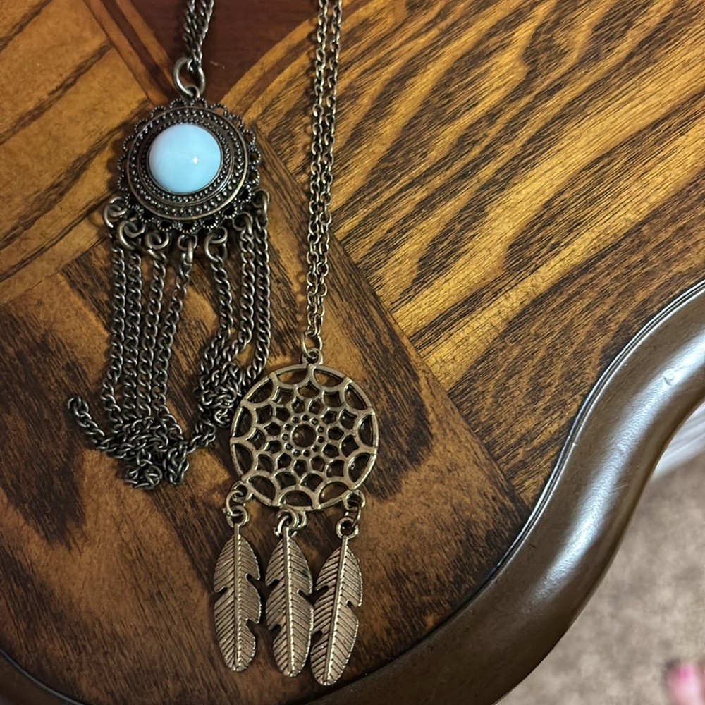Necklace bundle one with dream catcher and other w/ blueish round stone in ring